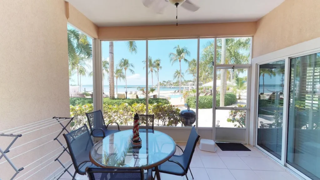 The screened porch, with room to sit back and relax